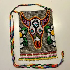 Crossbody hand beaded purse.